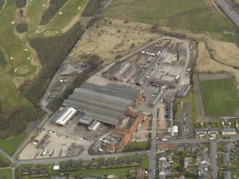 Oblque aerial view centred on the works, taken from the WSW.