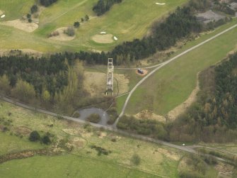 Oblque aerial view centred on the mine headgear, taken from the NNW.