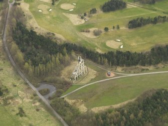 Oblque aerial view centred on the mine headgear, taken from the