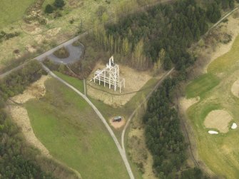 Oblque aerial view centred on the mine headgear, taken from the SW.