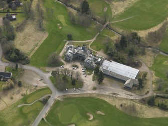 Oblique aerial view centred on the country house (hotel),  taken from the N.