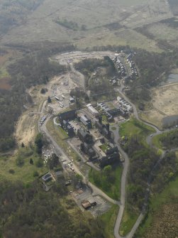 Oblique aerial view centred on the hospital, taken from the NE.