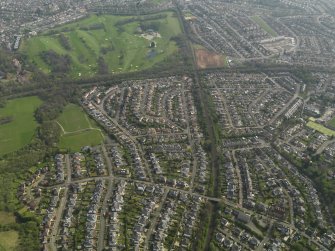 General oblique aerial view centred on the housing estate, taken from the NW.
