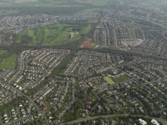 General oblique aerial view centred on the housing estate, taken from the NW.
