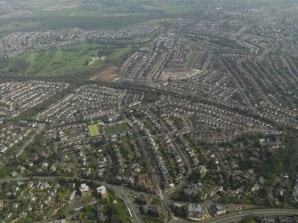 General oblique aerial view centred on the housing estate, taken from the WNW.