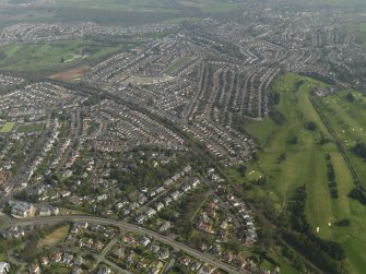 General oblique aerial view centred on the housing estate, taken from the W.