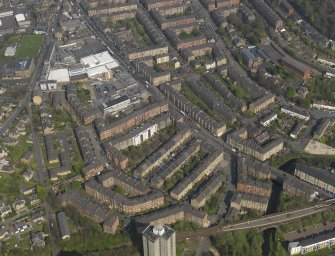 General oblique aerial view centred on the Kilmarnock Road, taken from the SW.
