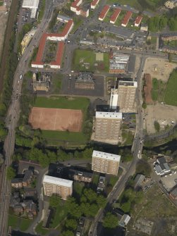 Oblique aerial view centred on the tower blocks, taken from the SSW.