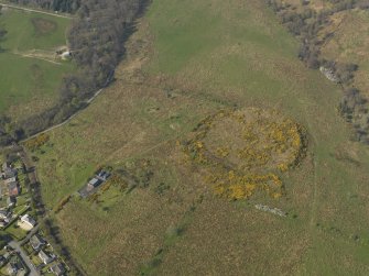 Oblique aerial view centred on the remains of the heavy anti aircraft battery, taken from the SE.