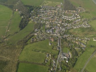 General oblique aerial view of the village, taken from the SE.