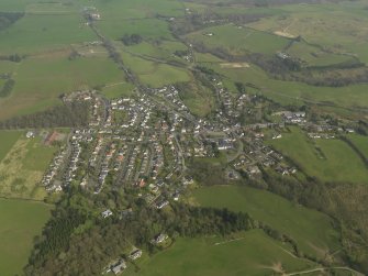 General oblique aerial view of the village, taken from the W.