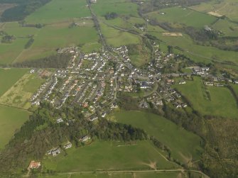 General oblique aerial view of the village, taken from the W.