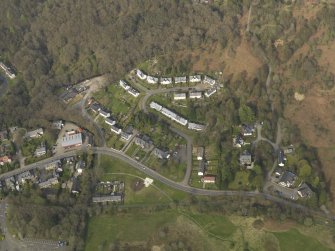 General oblique aerial view of the E end of the village, taken from the SSW.