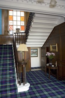 Interior. Ground floor, entrance hall, view of staircase from SSE