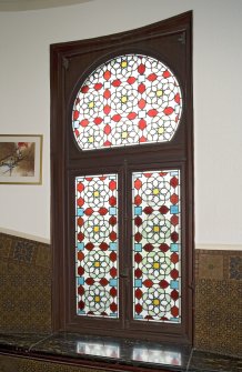 Interior. Ground floor, hall, detail of stained glass window at foot of stairs