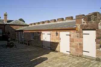 Range of outbuildings to N of house, view from courtyard to E