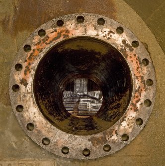 Interior showing detail of pipe end plate and view into one of the main oil tanks, Royal Naval Fuel Tanks, Inchindown.