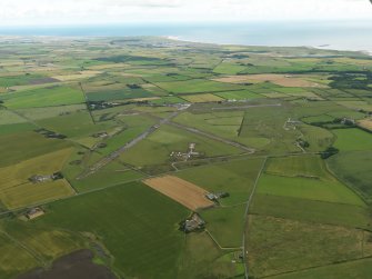 General oblique aerial view centred on the airfield, taken from the SSW.