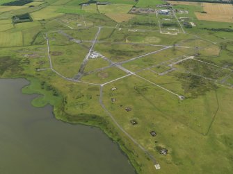 General oblique aerial view centred on the airfield, taken from the NW.