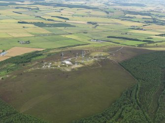 General oblique aerial view centred on the scatter station, taken from the NE.