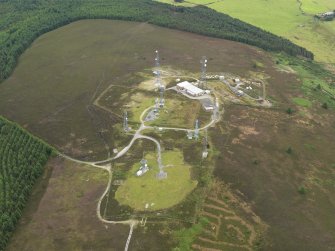 Oblique aerial view centred on the scatter station, taken from the SW.