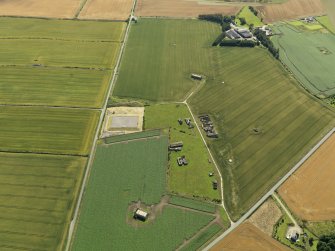 General oblique aerial view centred on the remains of the radar station, taken from the W.