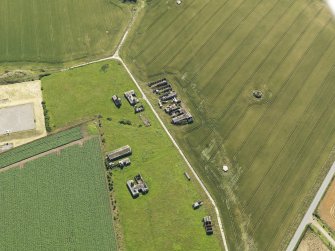 Oblique aerial view centred on the remains of the radar station, taken from the WNW.