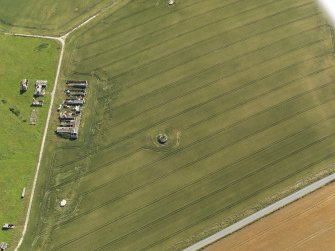 Oblique aerial view centred on the remains of the radar station, taken from the W.