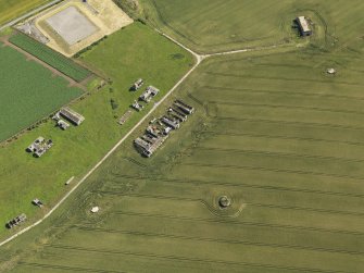 Oblique aerial view centred on the remains of the radar station, taken from the WSW.