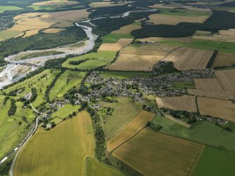 General oblique aerial view centred on the village, taken from the NNW.