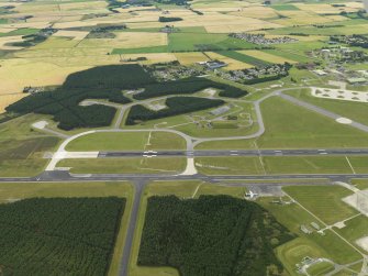General oblique aerial view centred on the airfield, taken from the NNW.