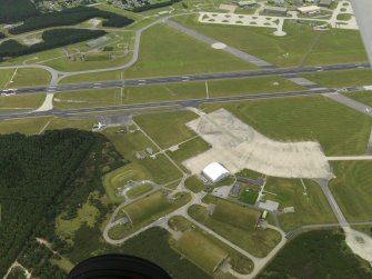 Oblique aerial view centred on the dispersal areas, taken from the N.