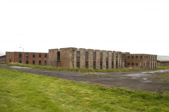 General view from N of transit accommodation buildings.