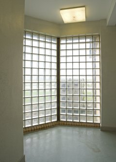 Interior view of ground floor glass wall panels.