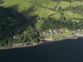 General oblique aerial view of the houses and cottages, taken from the ESE.
