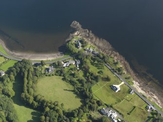 General oblique aerial view centred on the church, taken from the S.