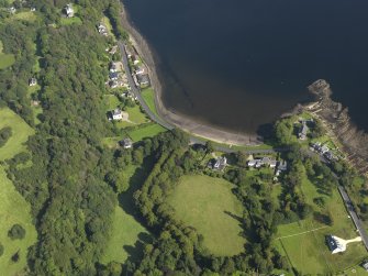 General oblique aerial view centred on the church, taken from the S.