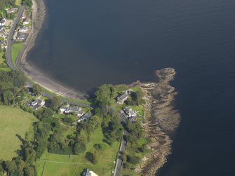 General oblique aerial view centred on the church, taken from the S.