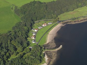 General oblique aerial view centred on the village, taken from the SSE.