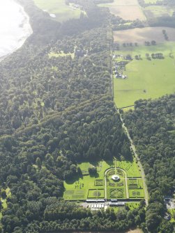 General oblique aerial view centred on the gardens, looking towards the kennels and house, taken from the N.