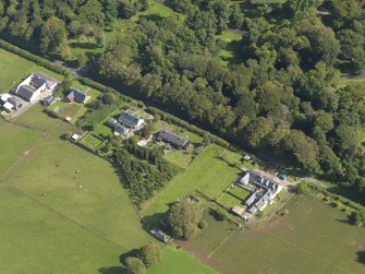 General oblique aerial view centred on the kennels, taken from the SW.