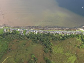 General oblique aerial view centred on the south part of the village, taken from the SW.