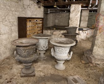 Interior. View of basement showing urns