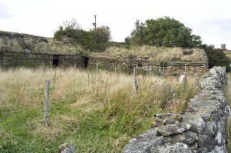 View of workshop enclosure at The Corr, from south-south-west.