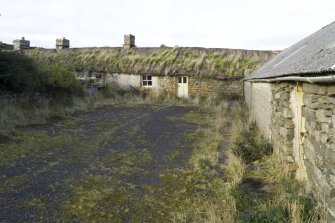 View of main cottage and yard at The Corr, from south-south-west.