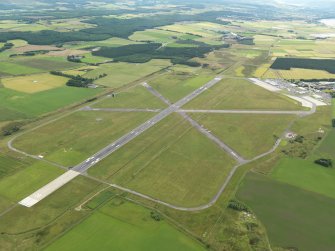 General oblique aerial view centred on the airfield, taken from the NNE.