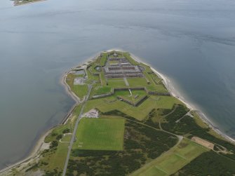 General oblique aerial view centred on the fortifications, taken from the ENE.