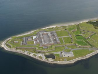 Oblique aerial view centred on the fortifications, taken from the S.