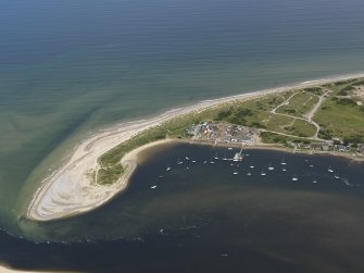 Oblique aerial view centred on the boatyard, taken from the SW.