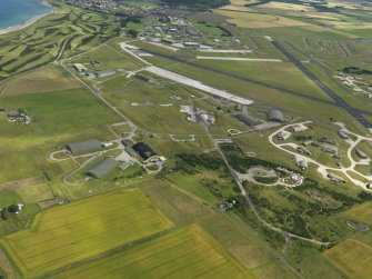 Oblique aerial view centred on the NW dispersal area , taken from the NW.